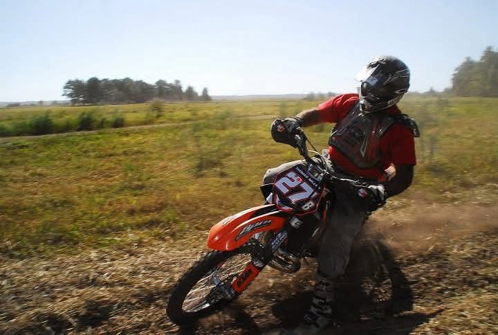Tom riding a dirt bike